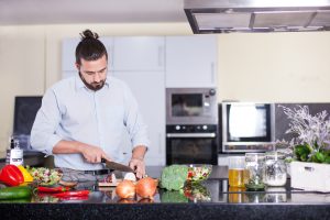Man in kitchen